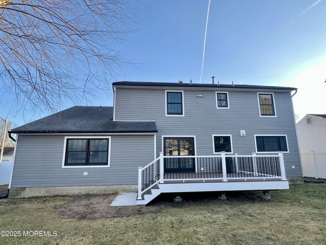 Fenced in backyard with new TREX deck. | Image 21