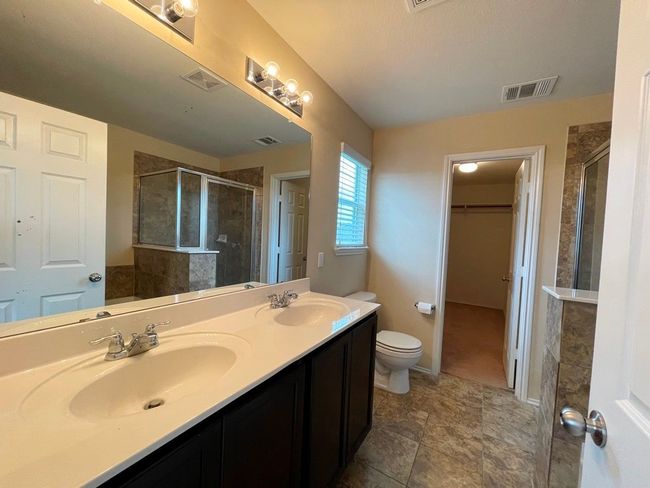 602 Moonwalker Trl, House other with 3 bedrooms, 3 bathrooms and 4 parking in Buda TX | Image 18