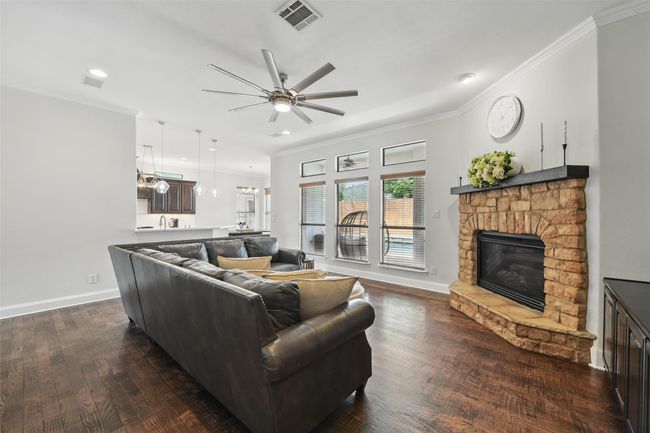 Get cozy in the winter with the stone faced gas fireplace. | Image 10