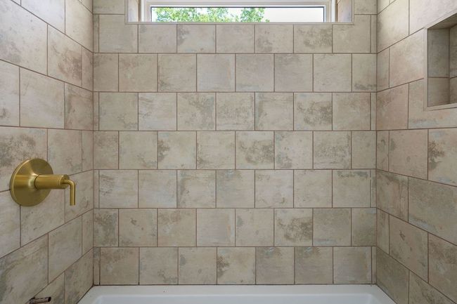 Bathroom featuring a healthy amount of sunlight | Image 18
