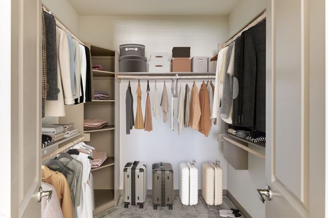 Walk in closet featuring carpet floors | Image 19