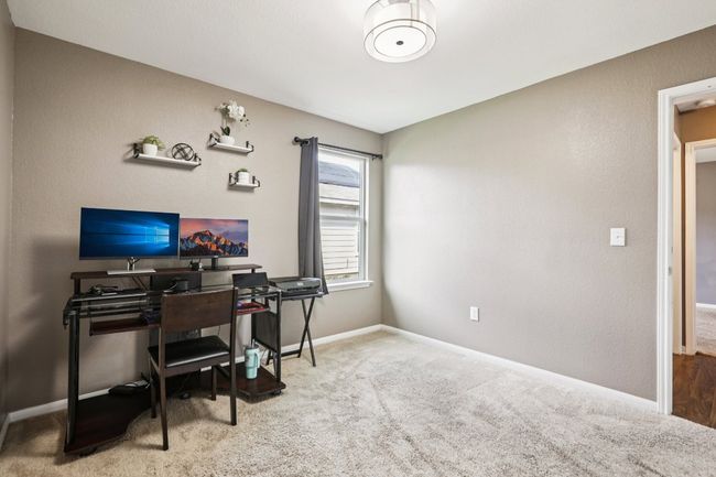 Office space with carpet flooring and baseboards | Image 24