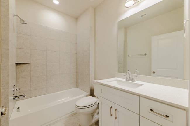 Full bathroom with vanity, shower / tub combination, and recessed lighting | Image 21