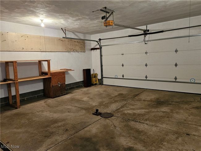 Garage featuring a garage door opener | Image 16