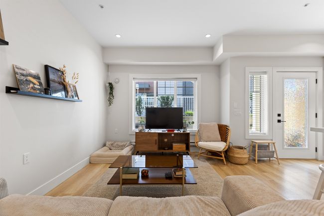 Living room featuring recessed lighting, baseboards, and wood finished floors | Image 7