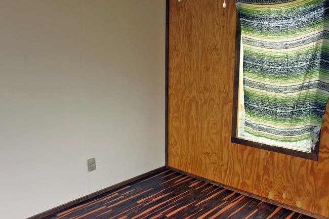 Spare room with dark wood-type flooring and baseboards | Image 29