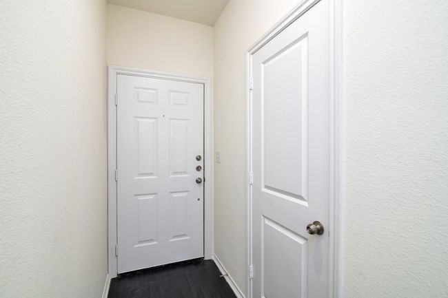 Doorway with dark hardwood / wood-style floors | Image 17