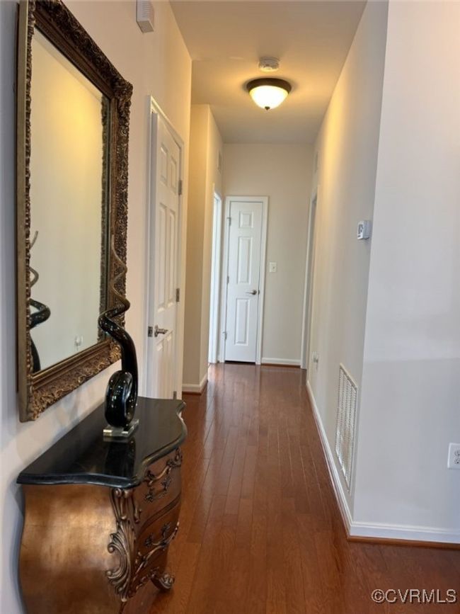 Corridor with dark wood-type flooring | Image 37