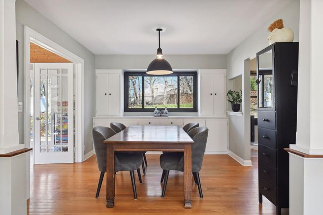 Dining room with built-in cabinets for storage | Image 15