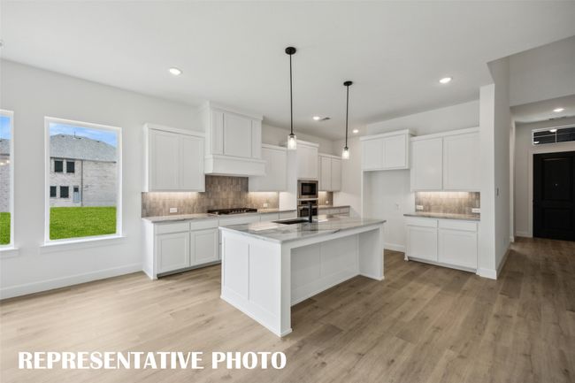 Our Royale plan pairs beautiful finishes with functional design to create your dream kitchen! REPRESENTATIVE PHOTO | Image 5