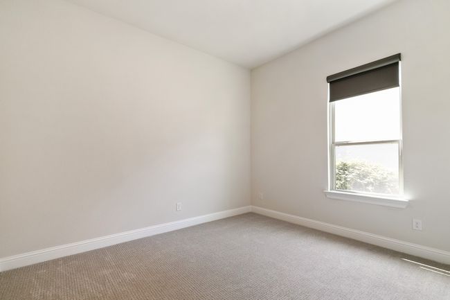 Carpeted empty room with baseboards | Image 8