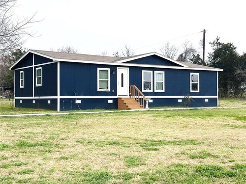 704 Riley St, Rockdale, TX, 76567-3348 | Card Image