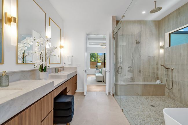 Full bath with a shower stall, double vanity, ensuite bathroom, and recessed lighting | Image 26