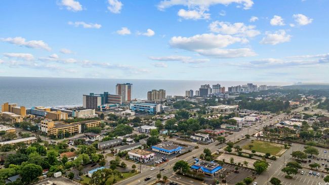 View of urban area with a nearby body of water | Image 32
