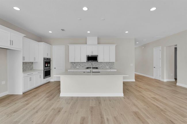323 Sawgrass Dr, Home with 4 bedrooms, 3 bathrooms and null parking in YULEE FL | Image 16