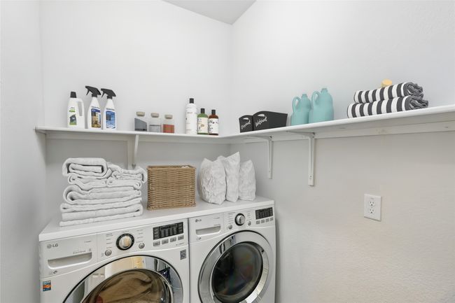 Laundry area featuring separate washer and dryer and laundry area | Image 13