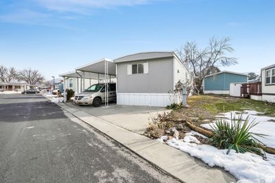 View of side of property with a carport | Image 2