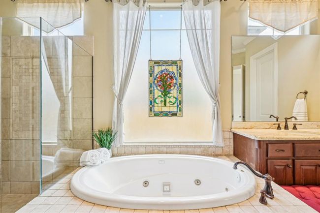 24807 Thorton Knolls Dr, House other with 4 bedrooms, 4 bathrooms and 3 parking in Spring TX | Image 24