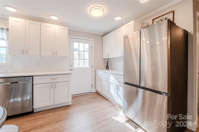 A counter depth refrigerator is included in the sale! | Image 14