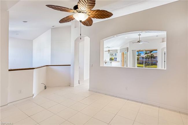 Bathroom featuring vanity, separate shower and tub, and tile patterned floors | Image 14