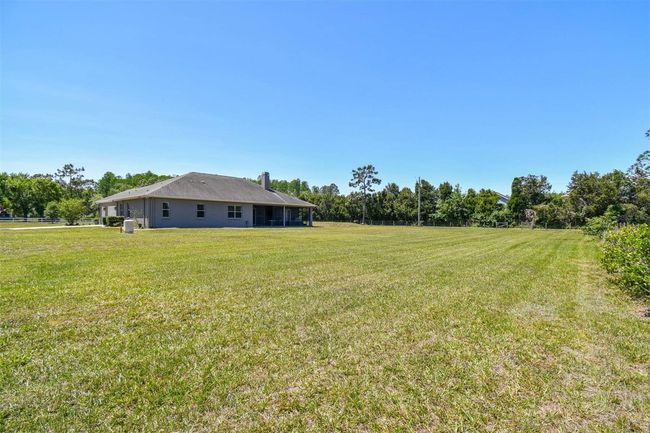 15513 Phillips Rd, House other with 4 bedrooms, 3 bathrooms and null parking in ODESSA FL | Image 94