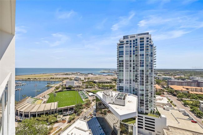 Enjoy the views of small planes landing and sailboats sailing from your balcony! | Image 26