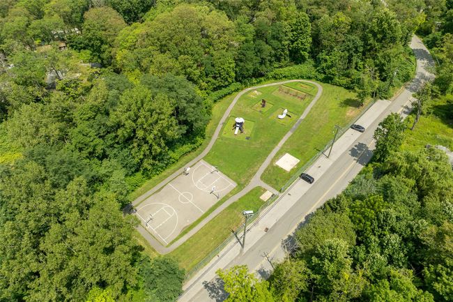Bird's eye view featuring a wooded view | Image 31