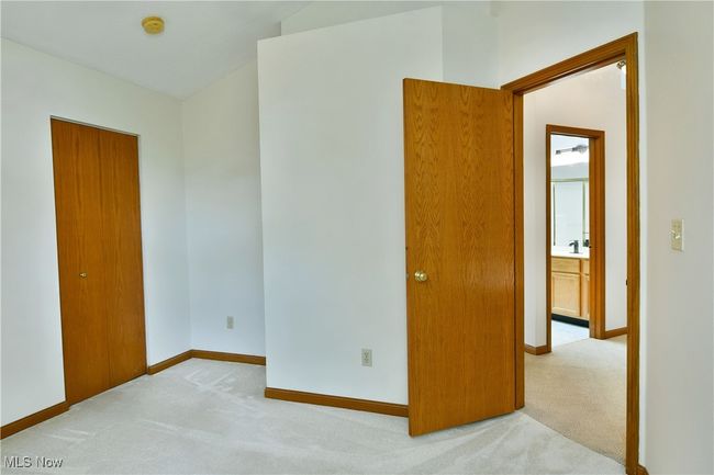 Unfurnished bedroom featuring carpet flooring and a closet | Image 29