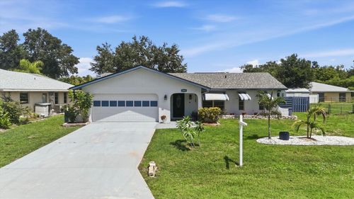 1042 Malay Ter Nw, PORT CHARLOTTE, FL, 33948-3619 | Card Image