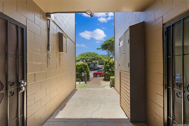 #117 on the right side with new security door and locks looking to Makakilo Dr and street parking | Image 13