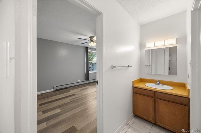 As you enter you will have a hallway and the bathroom and bedroom off to the North end of the condo | Image 5
