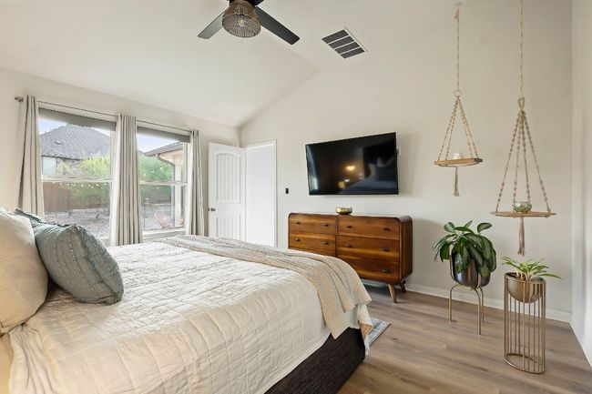Soft, neutral tones and abundant natural light create a relaxing ambiance. | Image 13