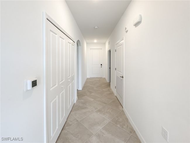 Hall featuring baseboards | Image 17