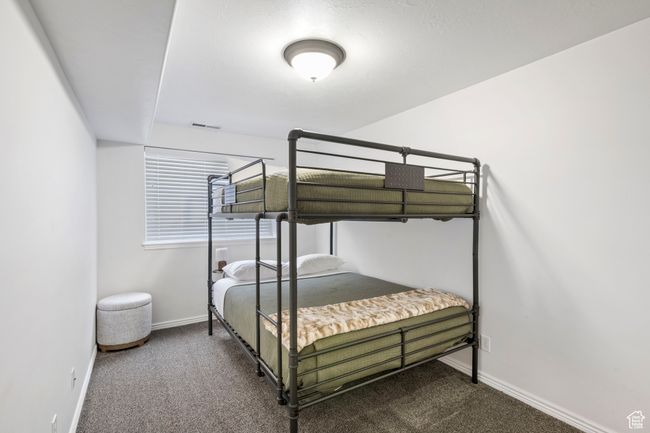 Bedroom featuring carpet | Image 24