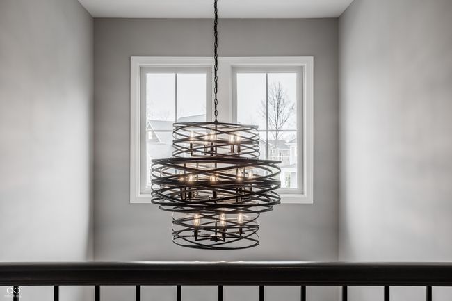 Beautiful view of the entry hall light fixture from the upstairs balcony. | Image 41