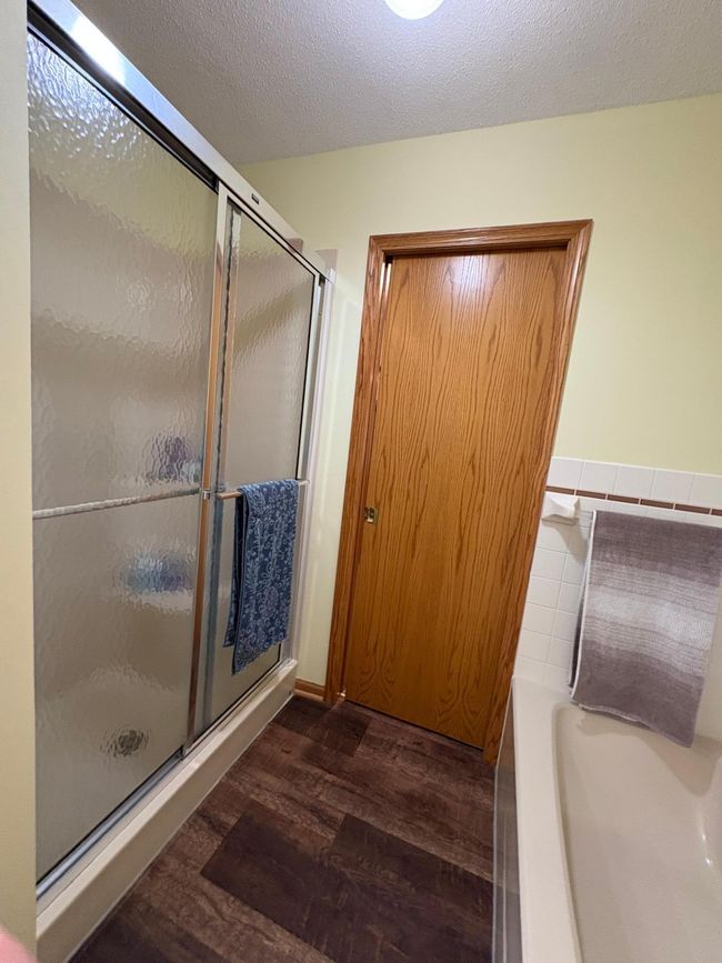main floor shower and tub | Image 27