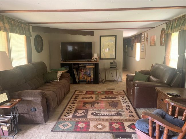 24645 Ne 177 Th Ter, House other with 2 bedrooms, 1 bathrooms and null parking in Fort Mc Coy FL | Image 51