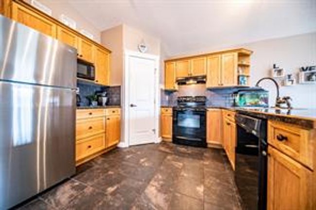 8870 74 Ave, House detached with 3 bedrooms, 1 bathrooms and 2 parking in Grande Prairie AB | Image 4