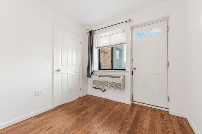 Entryway featuring wood finished floors and baseboards | Image 10