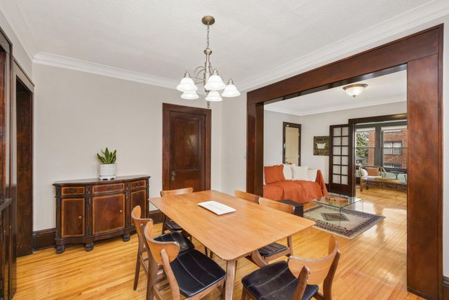 A convenient coat closet right off the living room. | Image 12