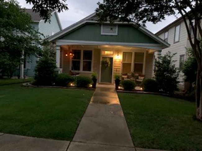 Bungalow with covered porch and a front yard | Image 5