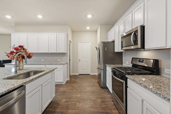 Spacious kitchen with Pantry and Laundry room off the kitchen. | Image 4