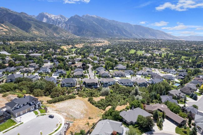 Aerial view of residential area with a mountain backdrop | Image 37