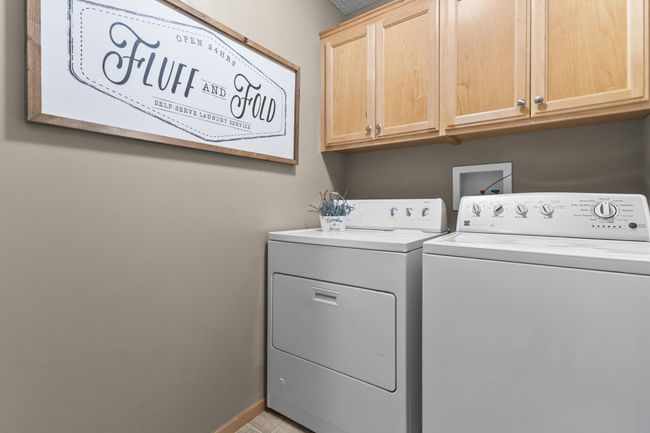 Upper laundry was upgraded with cabinetry | Image 16