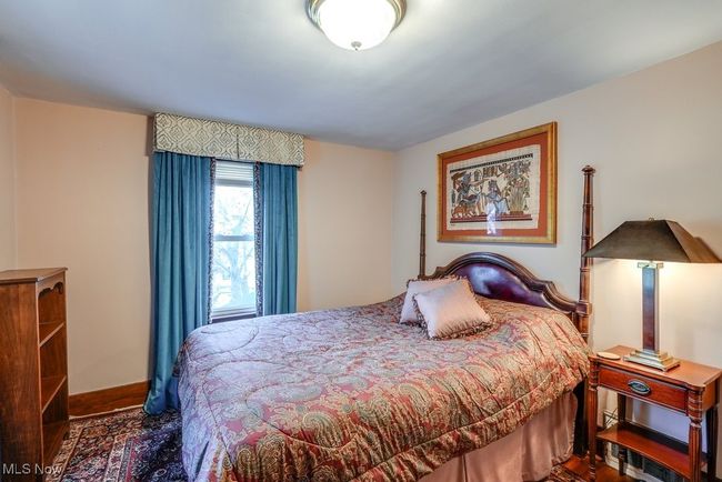 Bedroom with baseboards | Image 23
