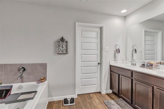 Another view of the primary bath which include double sinks and plenty of storage space | Image 31