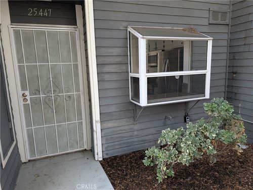 25447 Pine Creek Ln, Wilmington, CA, 90744-1852 | Card Image