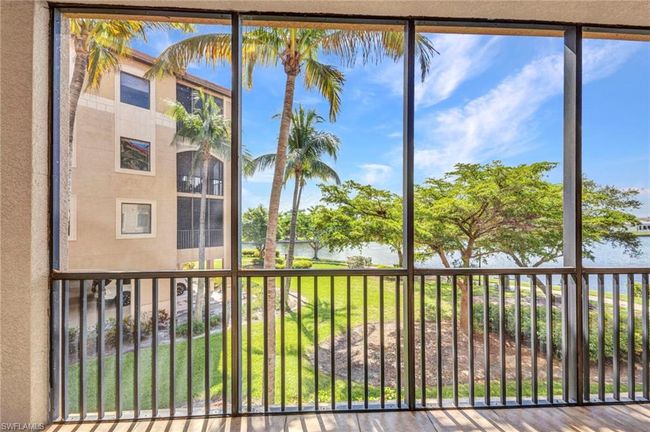 Unfurnished sunroom featuring a water view and healthy amount of natural light | Image 30