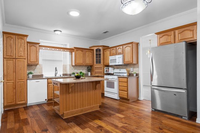The kitchen has incredible storage! | Image 14