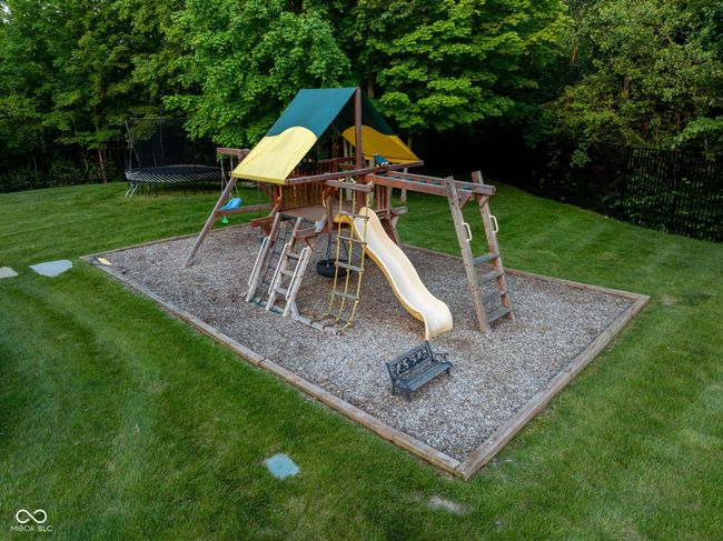 Play area, located behind pool | Image 106